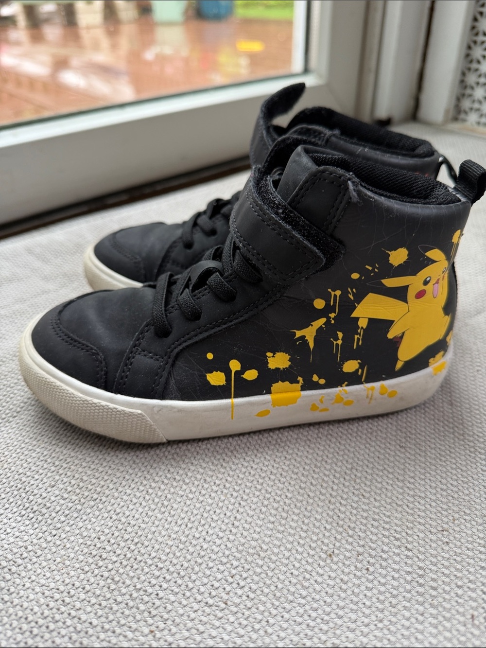next Black High-Top Sneakers with Yellow Character Splash